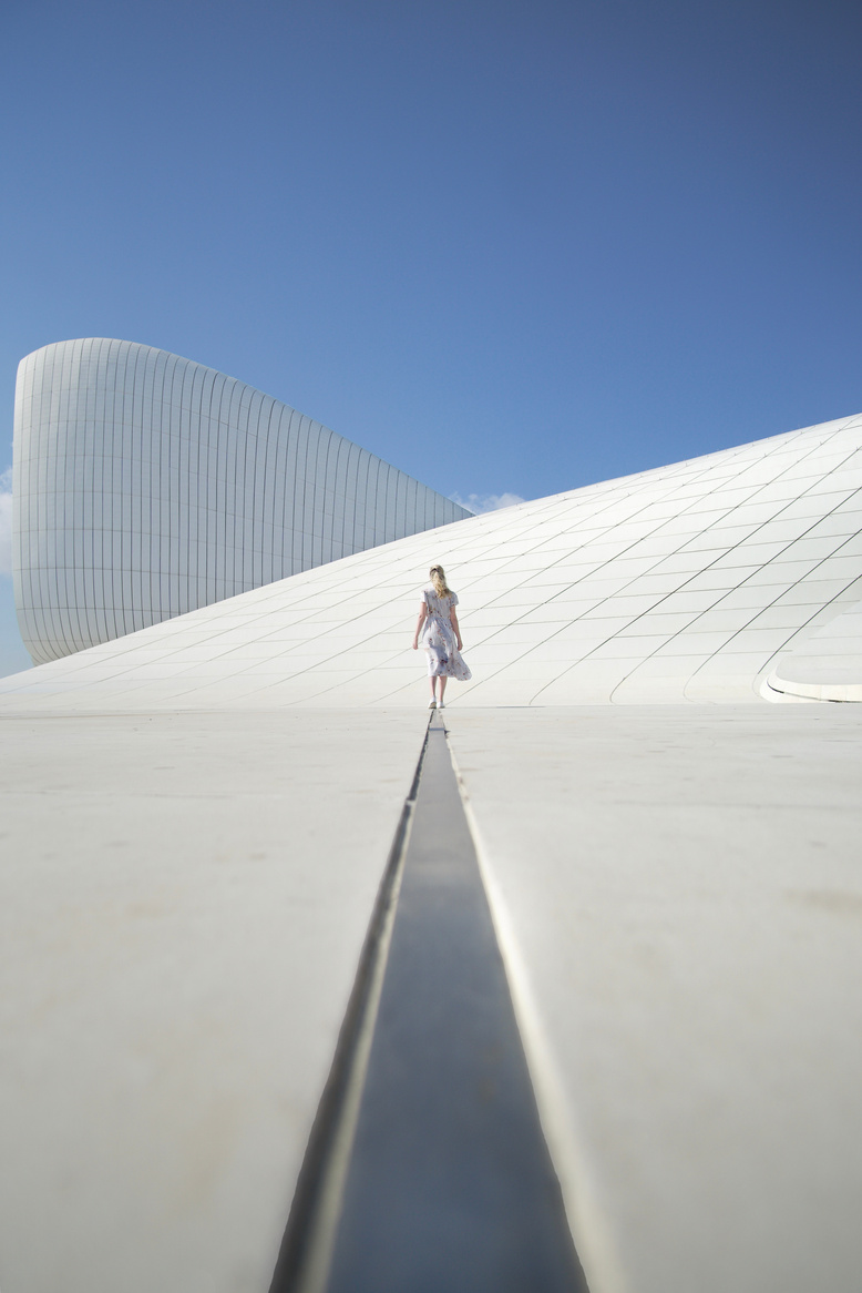 Woman Standing on Modern Building